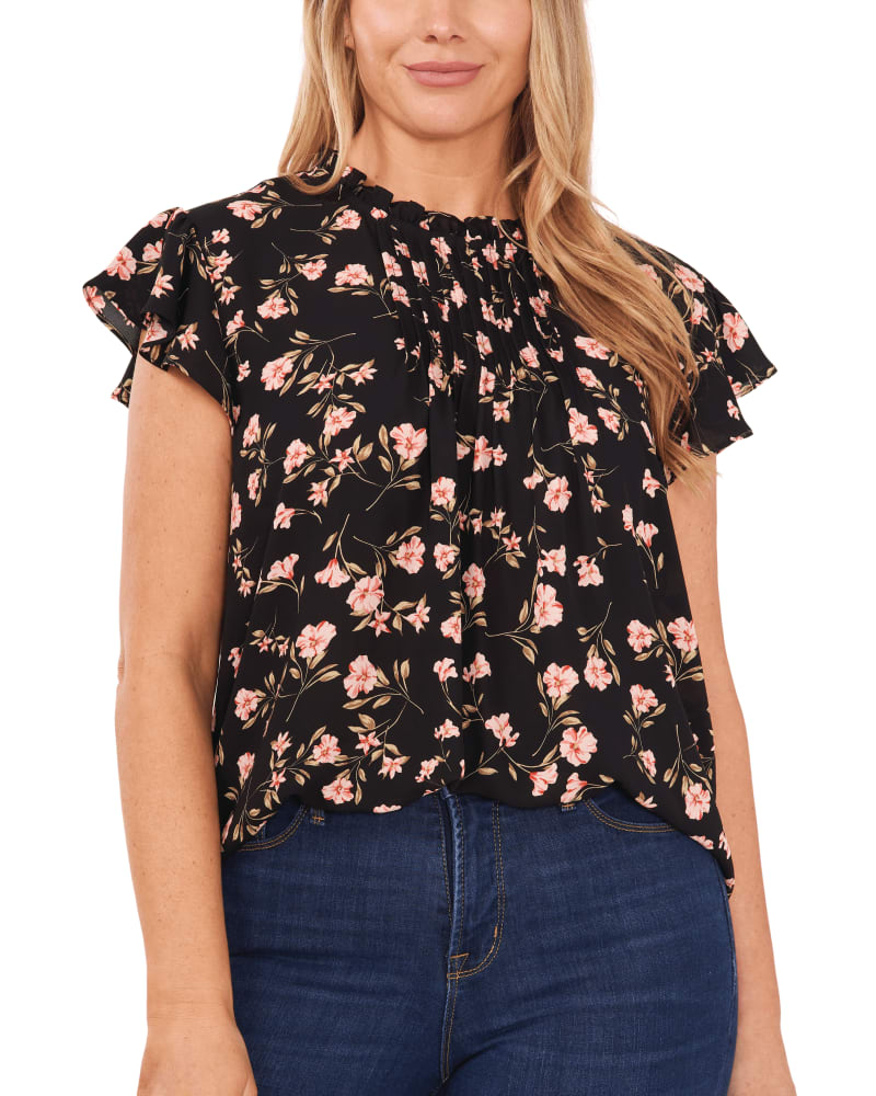 Front of a model wearing a size 1X Meriah Pintuck Blouse in RICH BLACK by CeCe. | dia_product_style_image_id:263957